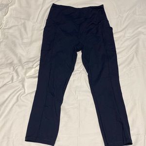 Blue womens exercise capris with pockets